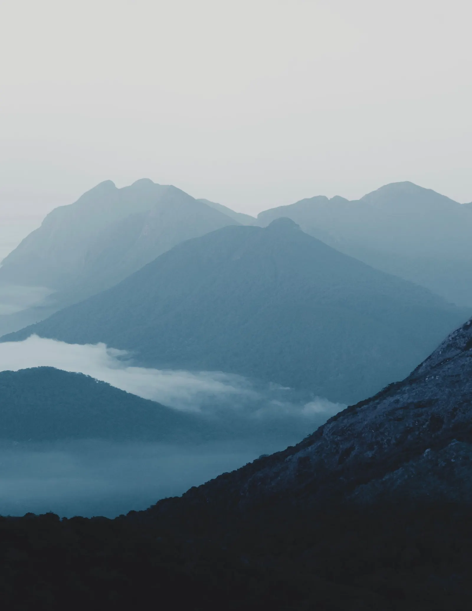 Mountain ranges in a foggy morning